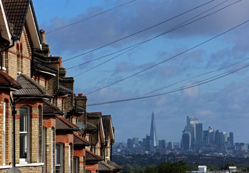 UK house prices hit record high but rise by least in 3 months, Halifax says