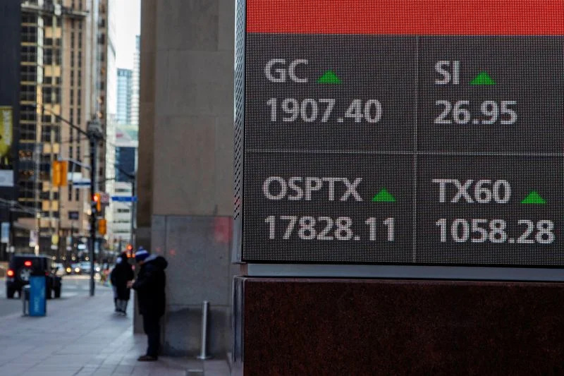 TSX hits record high as Fed chief signs off on rate cuts