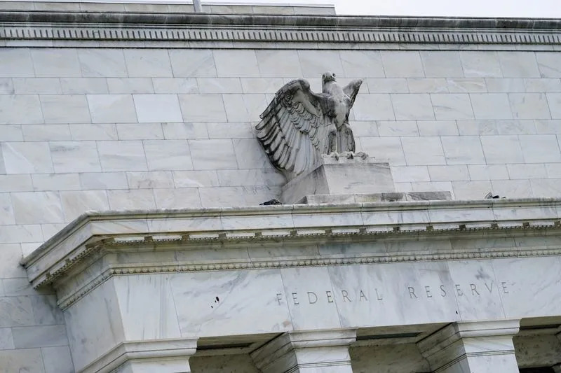 US Fed sets large bank capital levels after stress tests, eases on Goldman's level