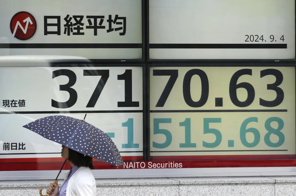 Asian stocks tumble after Wall Street drops on worries about the economy