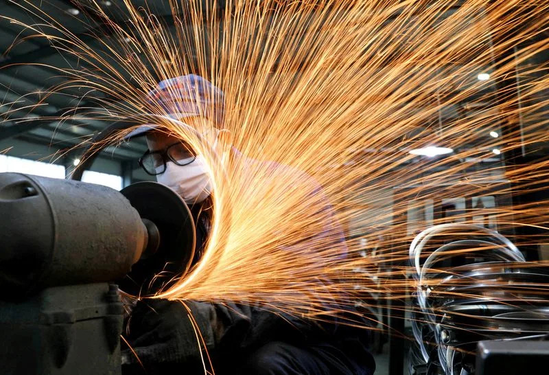 Global factory activity hit by economic uncertainty