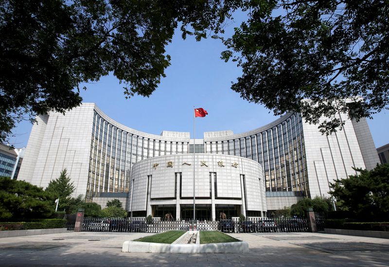 China's central bank head pledges to support economic recovery