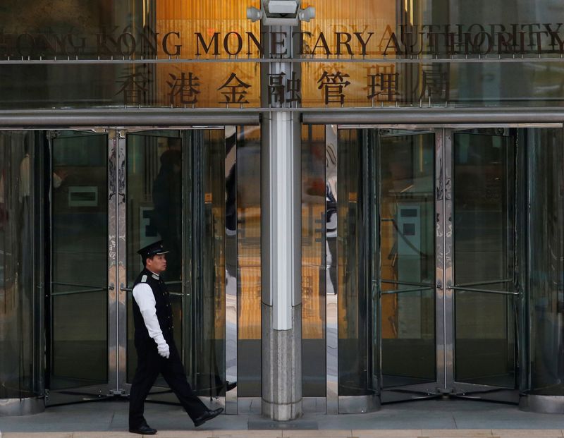 Hong Kong central bank cuts interest rate after Fed move, banks follow