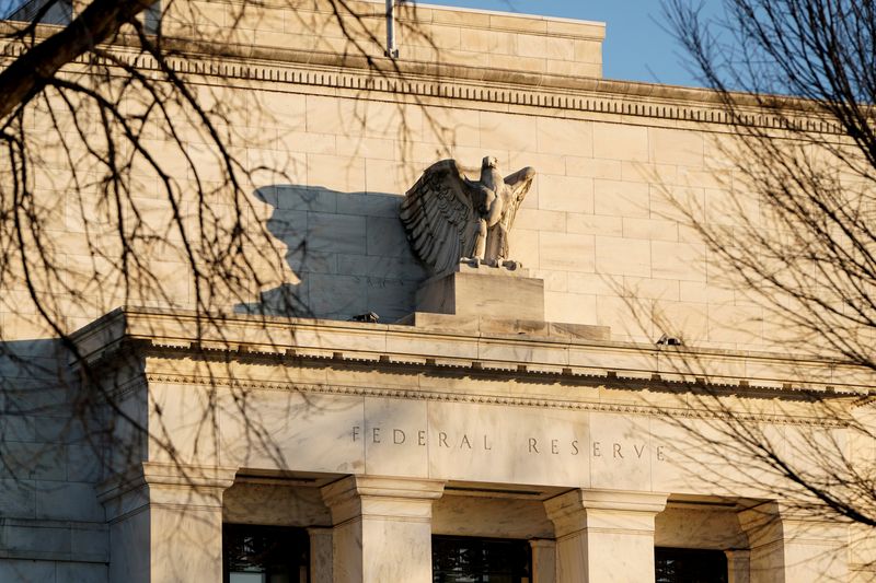 US monetary policy still restrictive, two Fed officials say