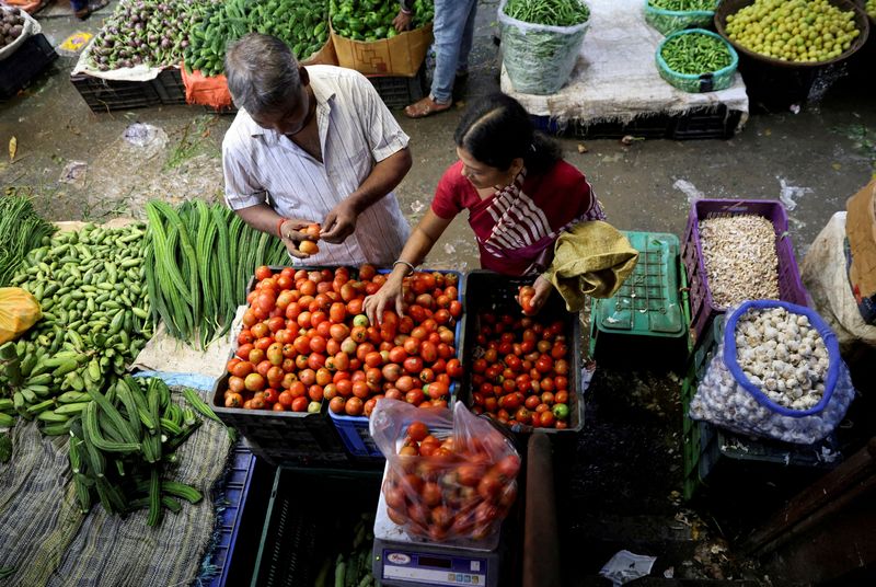 India expects food inflation to slow in coming months, government report says