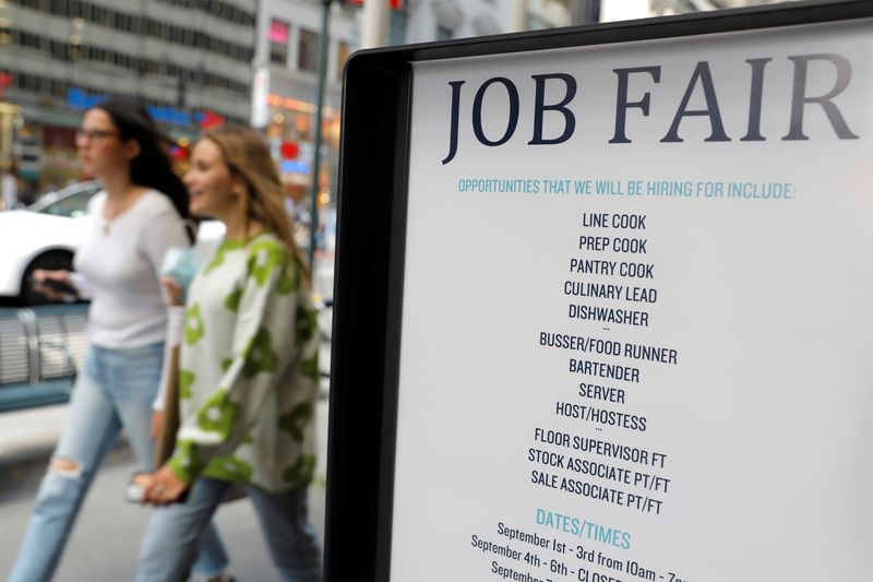 US weekly jobless claims slide to eight-month low