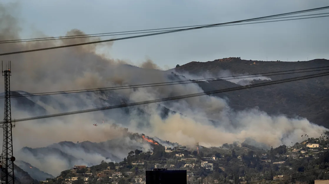 Edison International stock plummets as wildfires leave 70,000 Southern Californians without power