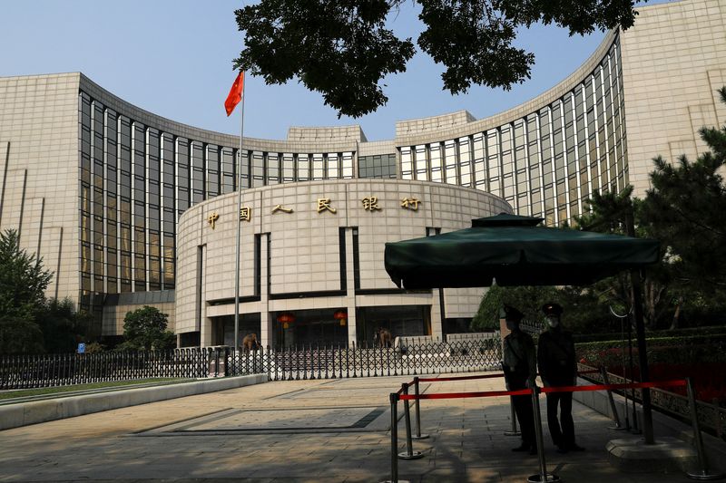 Chinese central banker warns of government bond risks as yields slide