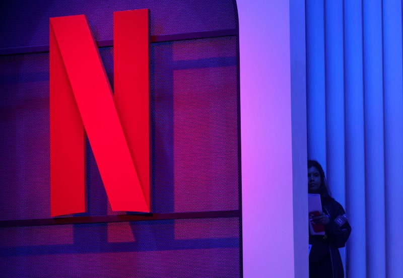 Netflix shares soar on record subscriber gains, planned price hikes