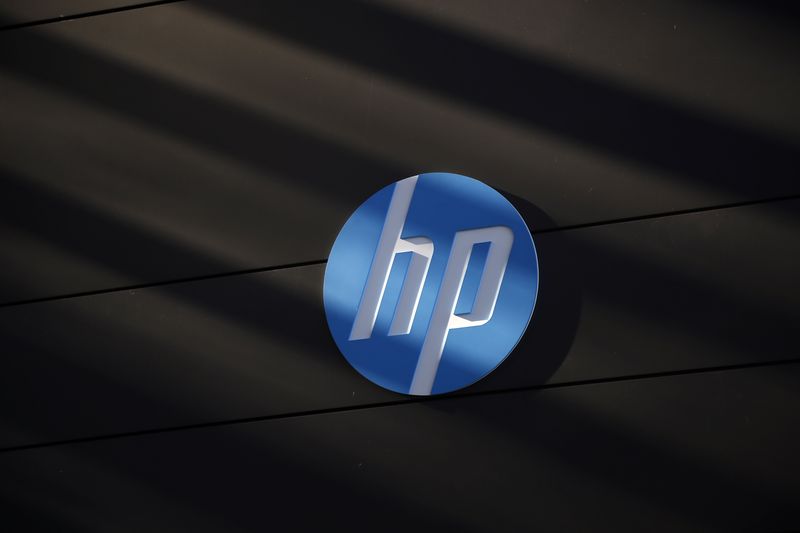 HP tops revenue estimates on PC market recovery; shares dip on weak profit view